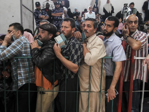 Palestinians wait at the Rafah border crossing with Egypt in the southern Gaza Strip, after it was opened for two days by Egyptian authorities, on May 11, 2016. Photo by Abed Rahim Khatib/Flash90.