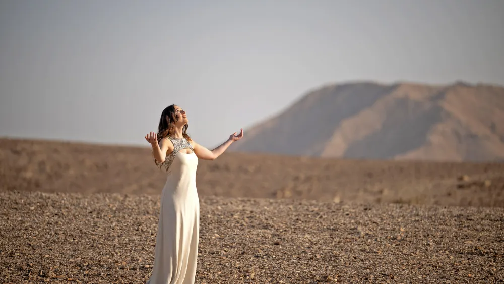 Nicole Raviv in the music video “The Whole Entire World Is a Very Narrow Bridge.” Photo by Shahar Azran/World Jewish Congress.