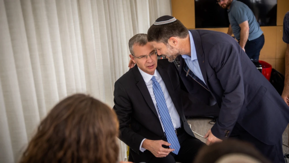 Likud MK Yariv Levin and Religious Zionism Party head Bezalel Smotrich at a conference ahead of the upcoming Israeli general elections, outside the Supreme Court in Jerusalem, Oct. 30, 2022. Photo by Yonatan Sindel/Flash90.