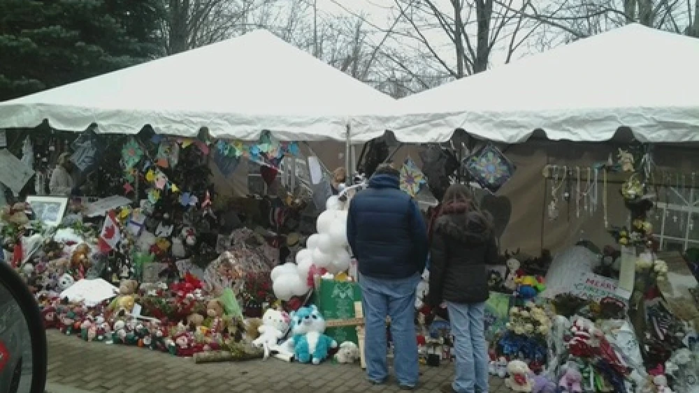 The Sandy Hook Elementary School shooting makeshift memorial on Berkshire Road in Newtown, Conn., 12 days after the December 2012 shooting. The shooting inspired Frank Storch's to create the new school safety tips guide, "Keep Your School Safe," a project he says he undertook "purely for the love of the Jewish people." Credit: Bbjeter via Wikimedia Commons.