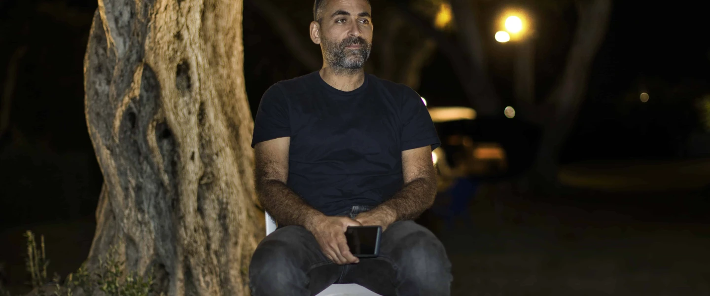 Avihai Brodutch waits for his wife and three kids held by Hamas in Gaza. Photo by Rina Castelnuovo.