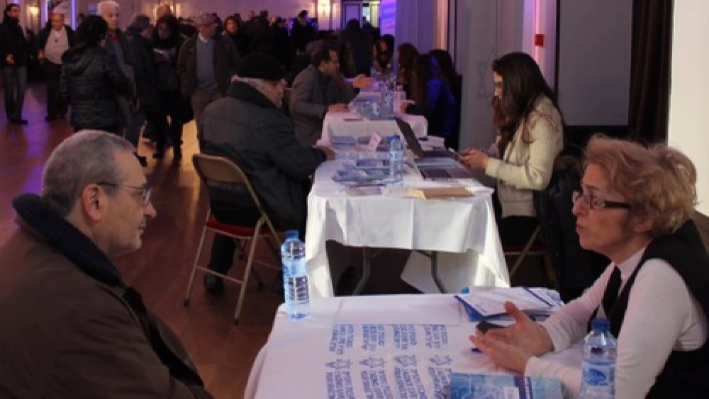 An aliyah information fair hosted by The Jewish Agency for Israel on Jan. 11 in Paris, days after a series of terror attacks in that city. The fair was planned before the attacks took place. Credit: Eliaou Zenou for The Jewish Agency for Israel.