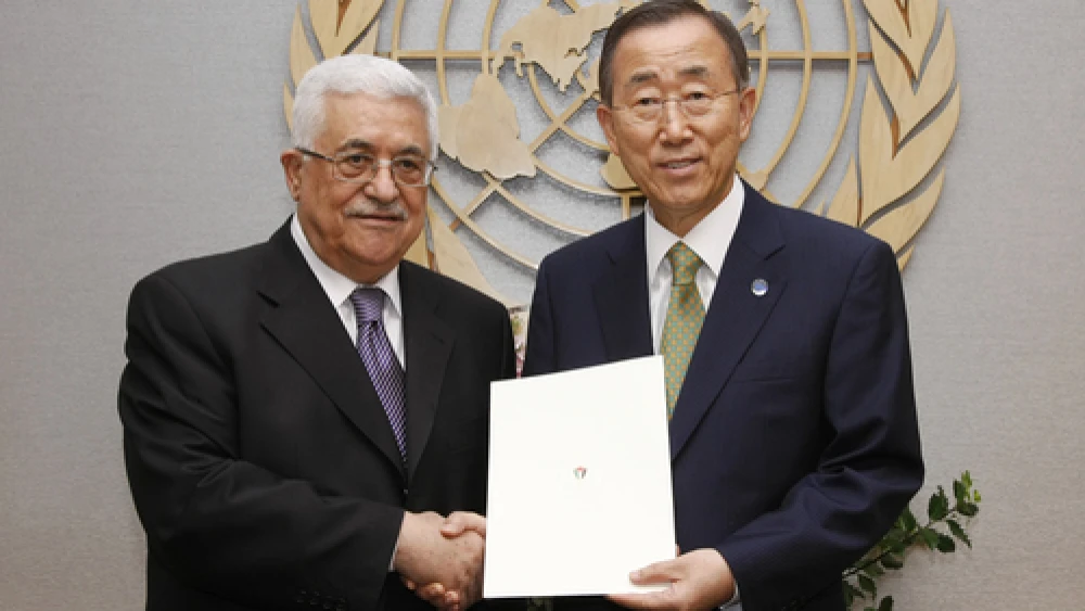 U.N. Secretary-General Ban Ki-moon (right) and Palestinian Authority leader Mahmoud Abbas pose for a photograph in September 2011 after Abbas submitted a formal application for P.A. .status as a U.N. member state. In early January 2015, Ban announced the approval of the P.A.'s request to join the U.N.-affiliated International Criminal Court, a body through which the P.A. intends to bring war crimes charges against Israel. Credit: U.N. Photo/Paulo Filgueiras.