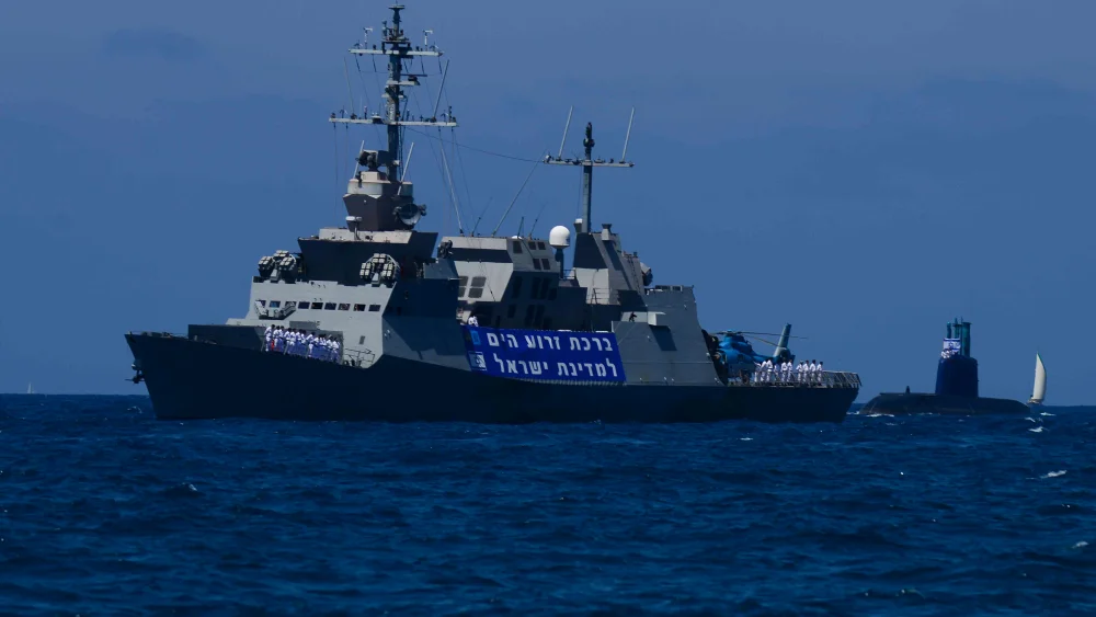 Israeli Navy submarine and a corvette vessel at a marine show as part on Israel’s 70th Independence Day celebrations near the shore of Tel Aviv on April 19, 2018. Photo by Tomer Neuberg/Flash90.