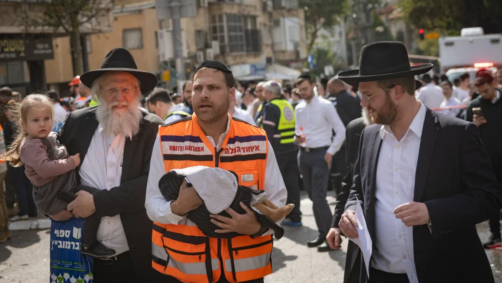 Israeli security and rescue personnel inspect the damage from an Iranian missile in Bnei Brak, east of northern Tel Aviv, March 15, 2026. Photo by Chaim Goldberg/Flash90.