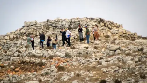 Jews raise Israeli flags on Mount Ebal in Nablus while on a visit to the altar of Joshua ben Nun during the Sukkot holiday, Oct. 02, 2023. Photo by Nasser Ishtayeh/Flash90.