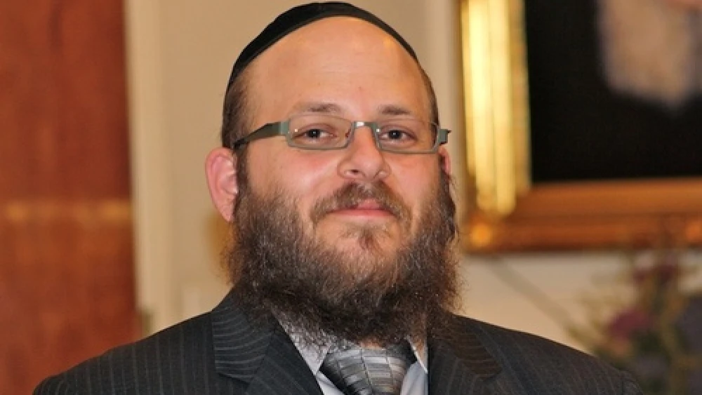Click photo to download. Caption: Rabbi Menachem Stern, pictured, was sworn in as a U.S. army chaplain in December 2011 following the resolution of his lawsuit against the army over its "no-beard" policy. Credit: Chabad.org.