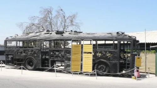 The charred remains of the Israeli bus hijacked by Palestinian terrorists in 1978 Coastal Road massacre, which was masterminded by female terrorist Dalal Mughrabi. Credit: MathKnight via Wikimedia Commons.