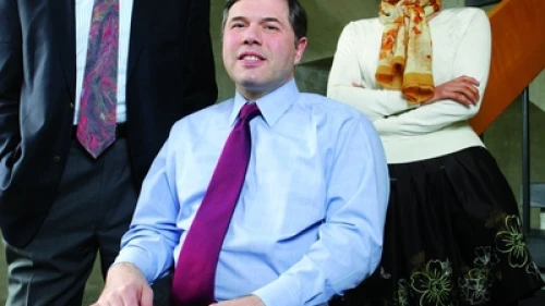 Pictured in center is Dr. Michael Ashley Stein, winner of the inaugural $100,000 Morton E. Ruderman Award in Inclusion. On the left is William P. Alford, who co-founded the Harvard Law School Project on Disability (HPOD) with Stein and is currently the project's chair. On the right is Fenming Cui, director of the China Program at HPOD. Credit: Aynsley Floyd.