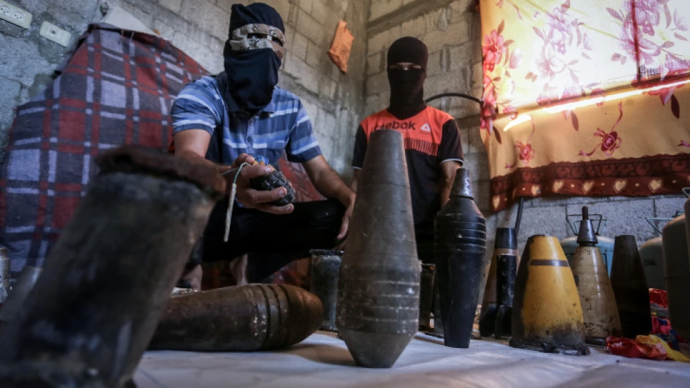 Palestinians prepare flammable materials and explosives to be attached to balloons and launched into Israel from Gaza, in Rafah, southern Gaza Strip, on Aug. 8, 2020. Photo by Abed Rahim Khatib/Flash90.
