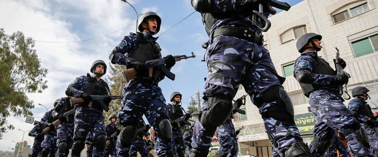 Palestinian Authority security personnel parade in the Judea city of Hebron, Nov. 14, 2017. Photo by Wisam Hashlamoun/Flash90.