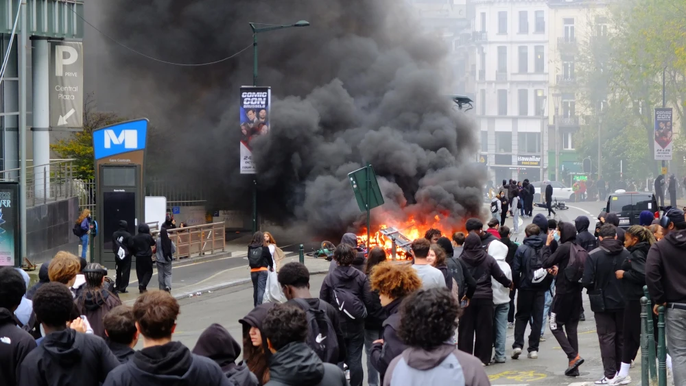 Students start a fire as part of protests on a street near the Brussels-Central railway station in the capital city of Belgium, Oct. 8, 2026. Credit: Indianajonesdog/Creative Commons via Wikimedia Commons.