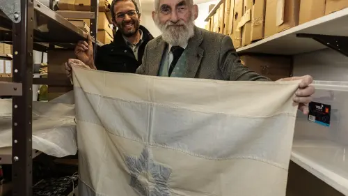 An Israeli flag created by Rebecca Affachiner, often called “the Betsy Ross of Israel,” donated to the Ben-Gurion Archives at the university’s Sde Boker Campus. Credit: American Associates, Ben-Gurion University of the Negev.