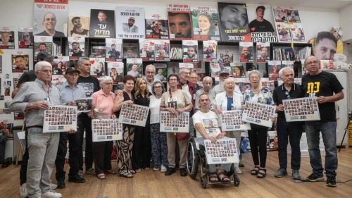 Holocaust survivors pose for a photograph after meeting released hostages families of hostages still being held in Gaza, in Tel Aviv on August 5, 2025. Photo by Chen Schimmel.