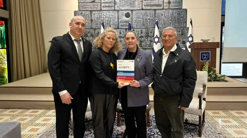 Jewish Agency CEO Yehuda Setton (left); Jewish Agency’s Fund for the Victims of Terror chair Ayelet Nahmias-Verbin; and Jewish Agency chairman Maj. Gen. (res.) Doron Almog present the report to first lade Michal Herzog (second from right), Feb. 17, 2025. Credit: Courtesy.