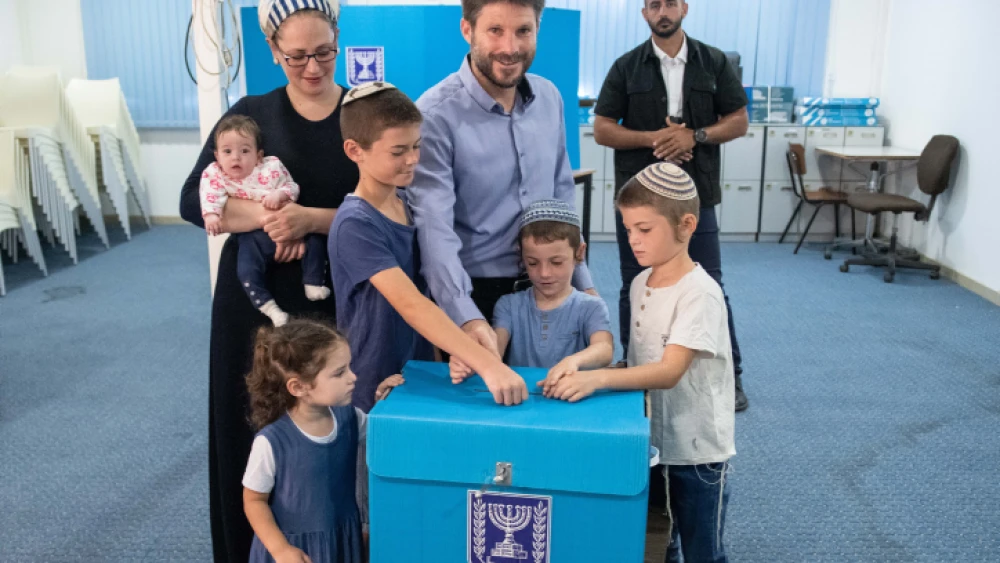 Yamina Party candidate Bezalel Smotrich and his family cast their ballots at a voting station in Kdumim on Sept. 17, 2019. Photo by Sraya Diamant/Flash90.