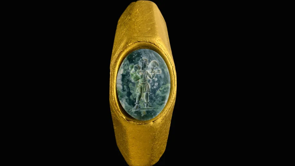 The ancient gold ring, with a gemstone depicting the "Good Shepherd," which was found off the coast of Caesarea in 2021. Credit: Israel Antiquities Authority.