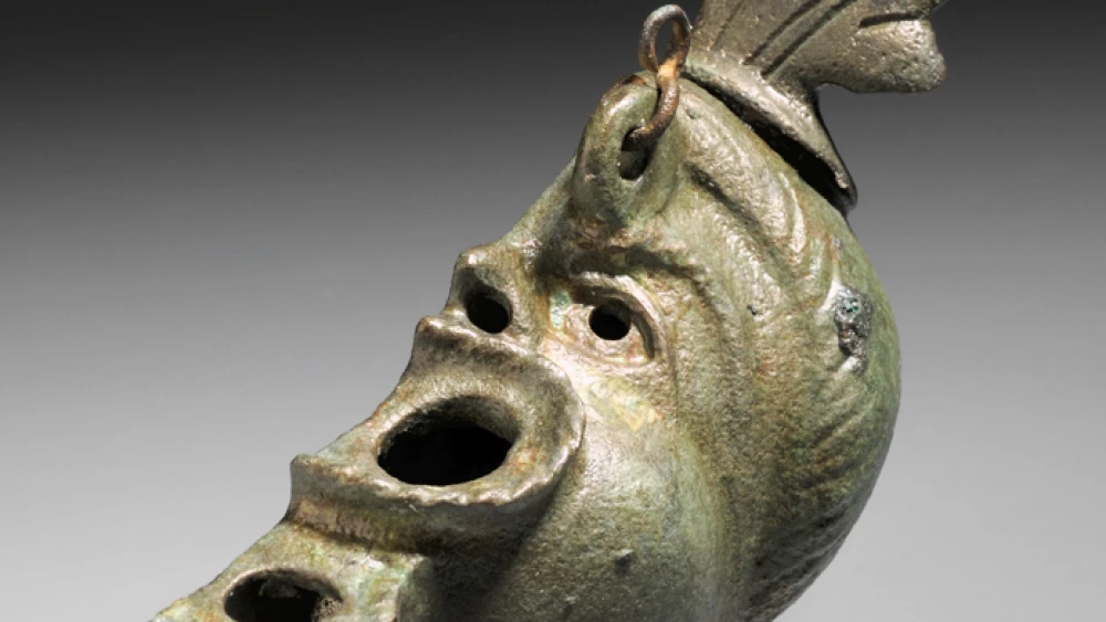 The ancient oil lamp uncovered in Hungary nine years before the May 2021 discovery in Jerusalem of its mirror image. Credit: Bakos Ágnes–Tihanyi Bence.