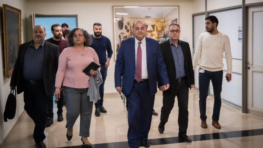 Joint Arab List leader Ahmad Tibi arrives at the Knesset in Jerusalem for talks with representatives of the Blue and White Party, on March 11, 2020. Photo by Yonatan Sindel/Flash90.
