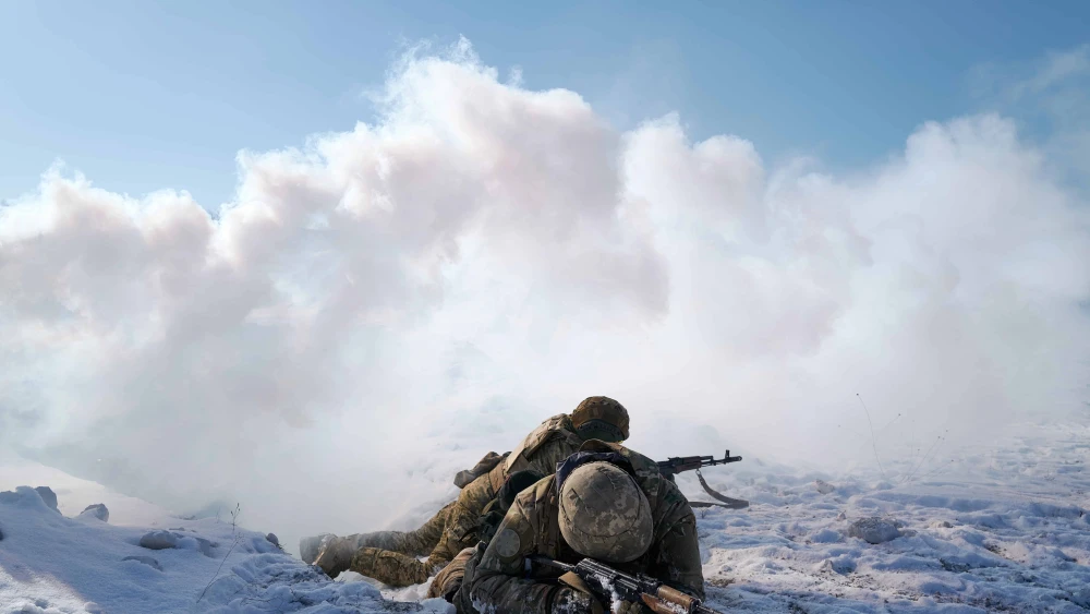 Infantry soldiers of the Armed Forces of Ukraine, including both new recruits and experienced servicemen, train together near Donetsk, Ukraine, before deploying to the frontlines against Russian forces, Feb. 21, 2025. Photo by Pierre Crom/Getty Images.