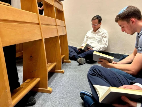 Israeli President Isaac Herzog participates in a reading of the book of Lamentations at the Ohel Nechama Synagogue in Jerusalem, July 13, 2024. Credit: Courtesy.