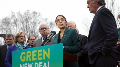 Rep. Alexandria Ocasio-Cortez (D-N.Y.) speaks on the Green New Deal with Sen. Ed Markey (D-Mass.) to her right in front of the Capitol Building in Washington, D.C., on Feb. 7 2019. Credit: Wikimedia Commons.