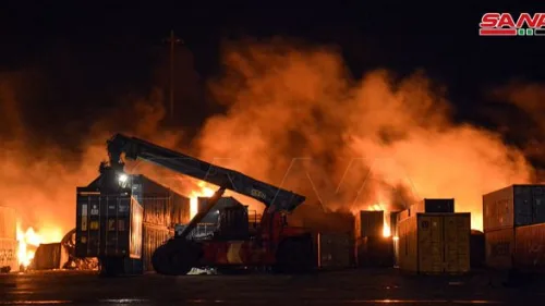 The aftermath of an alleged Israeli missile strike on the container yard of Syria's Latakia port, Dec. 28, 2021. Credit: Syrian Arab News Agency.