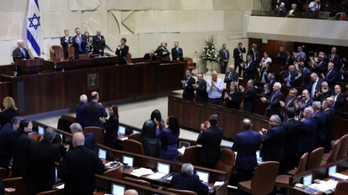 Knesset Members applaud as U.S. Vice President Mike Pence speaks at the special plenary session at the Knesset, Israel's Parliament, in Jerusalem, on Jan. 22, 2018. Photo by Gil Yochanan/POOL