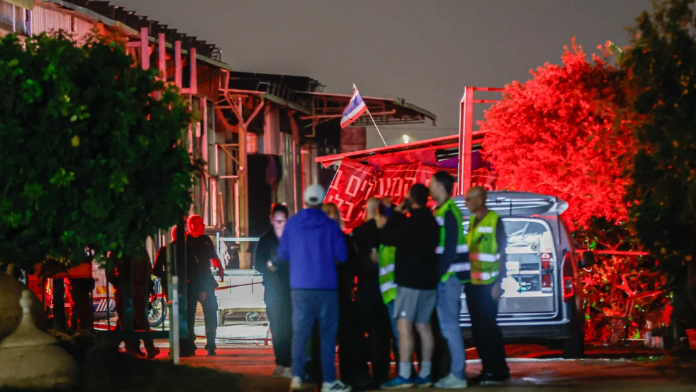 Israeli security and rescue forces at the scene where a missile fired from Iran killed a foreign worker, in Moshav Adanim in central Israel, March 19, 2026. Photo by Tal Gal/Flash90.