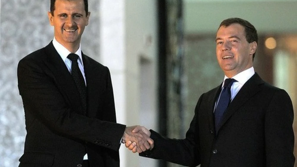 Syrian President Bashar Assad and Russian Prime Minister Dmitry Medvedev meet in Syria in May 2010. Russia has proposed a plan to secure Syria chemical weapons. Credit: Presidential Press and Information Office.