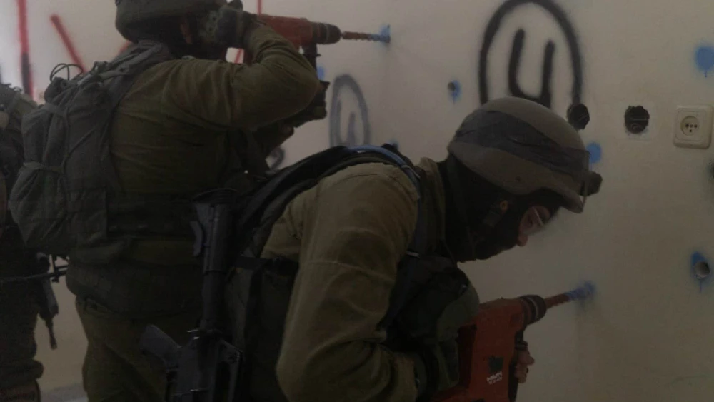 Israeli forces preparing for demolition the home of one of the Hamas terrorists responsible for the June shooting attack that killed four Israelis near Eli, Nov. 14, 2023. Credit: IDF.