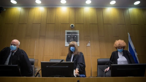 Tel Aviv District Court justices arrive in court on on July 14, 2020. Photo by Miriam Alster/Flash90.