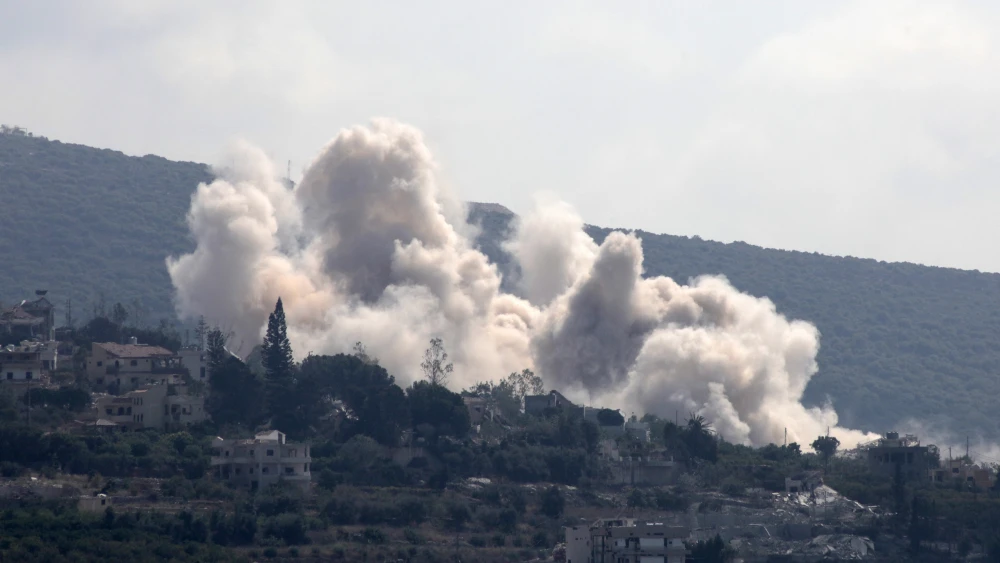 This photo taken from the southern Lebanese city of Tyre shows smoke rising following an Israeli strike that targeted the village of Biout es Sayed on Aug. 26, 2026. Photo by Kawnat Haju/AFP via Getty Images.