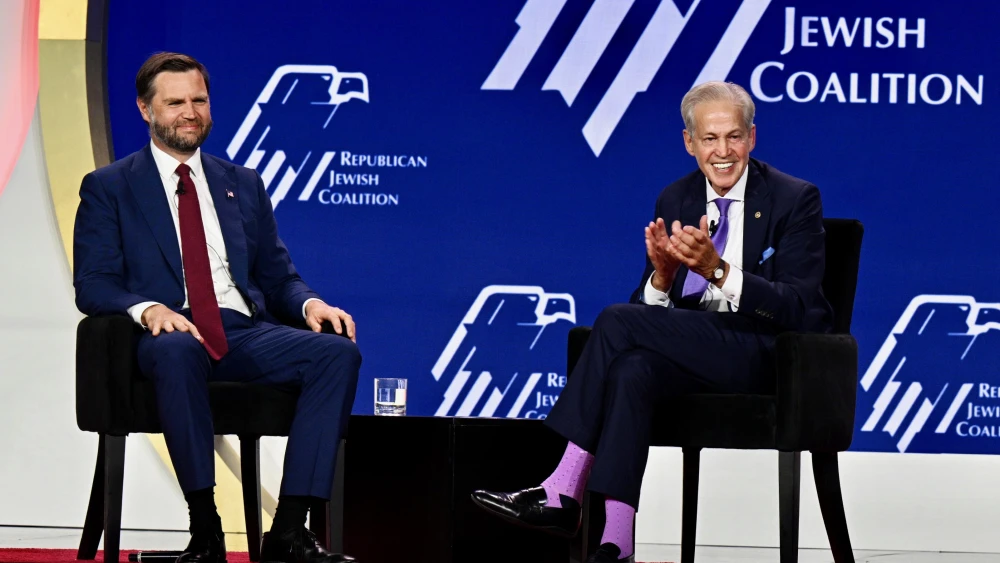 U.S. Vice President JD Vance speaks with former Sen. Norm Coleman at the Republican Jewish Coalition summit in Las Vegas on Aug. 31, 2026. Credit: Republican Jewish Coalition.