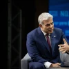 Yesh Atid Party head Yair Lapid attends a conference of the Israeli Television News Company in Jerusalem on March 7, 2021. Photo by Yonatan Sindel/Flash90.
