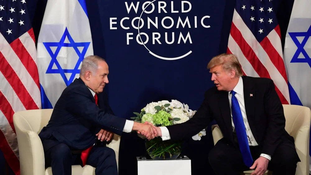 Israeli Prime Minister Benjamin Netanyahu and President Donald Trump meet at the World Economic Forum in Davos, Switzerland. Credit: Amos Ben-Gershom/GPO.