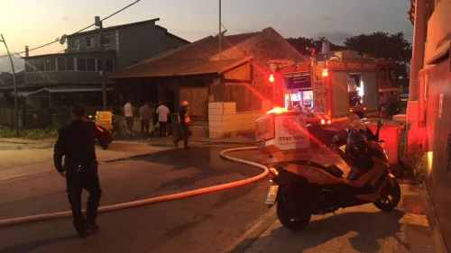 Israeli police and emergency service treat a man injured by rocket fire from Gaza in Sderot. Source: United Hatzalah via Twitter.