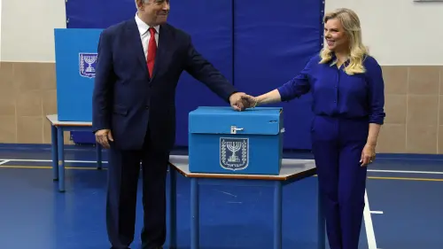 Israeli Prime Minister Benjamin Netanyahu and his wife, Sara, cast their vote at a polling station in Jerusalem during the Knesset Elections, on April 9, 2019. Credit: Haim Zach/GPO.