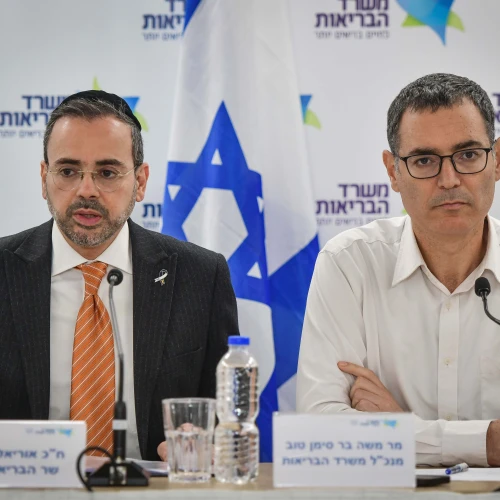Health Minister Uriel Buso (left) and Moshe Bar Siman Tov