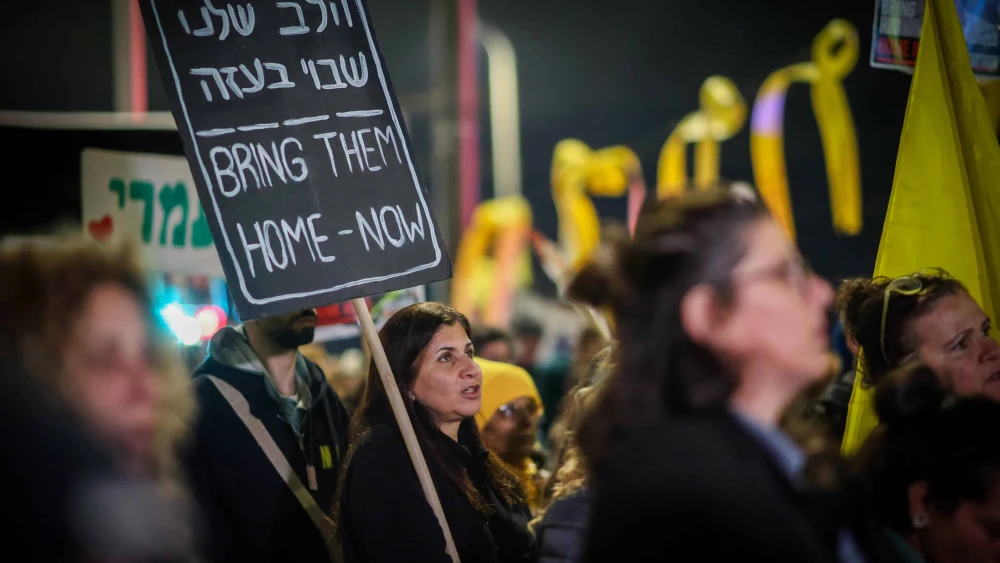 Demonstrators protest calling for the release of Israeli hostages held in the Gaza Strip outside the southern Israeli city of Sderot, Feb. 8, 2025. Photo by Dor Pazuelo/Flash90.