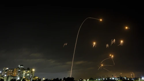 A long-exposure shot shows the Iron Dome air-defense system intercepting missiles launched from Hamas in the Gaza Strip towards Israel, as seen from the southern Israeli city of Ashkelon, on May 10, 2021. Photo by Edi Israel/Flash90.