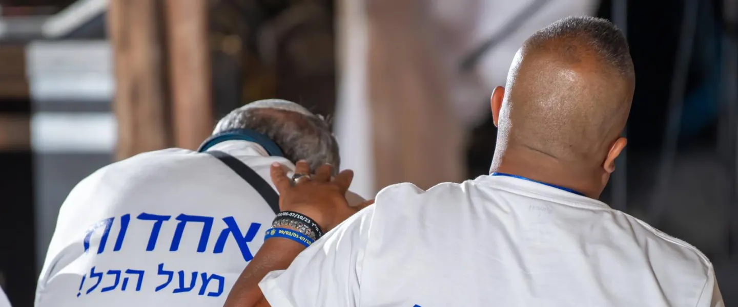 Two bereaved fathers at the "Hayeladim Shelanu" event at Psagot Winery on July 9, 2026. Credit: Courtesy.