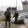 Israeli soldiers at the scene of a car-ramming attack in the Hebron Hills, May 14, 2020. Photo by Wisam Hashlamoun/Flash90.