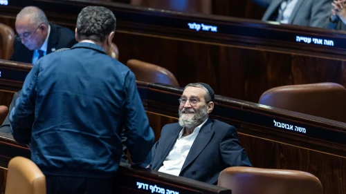 Defense Minister Israel Katz speaks with United Torah Judaism Knesset member Moshe Gafni during a vote on the proposal to dissolve parliament, June 12, 2025. Photo by Chaim Goldberg/Flash90.