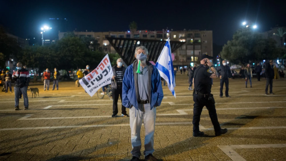 Israelis protest against Israeli Prime Minister Benjamin Netanyahu at Rabin Square in Tel Aviv on Nov. 28, 2020. Photo by Miriam Alster/Flash90.