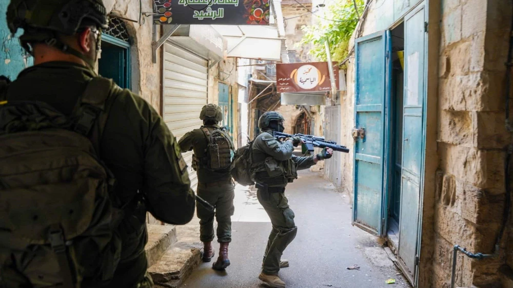 Israeli forces conduct a counterterrorism operation in the Kasbah of Nablus, searching structures and apprehending suspects as part of Operation Iron Walls. Credit: IDF.