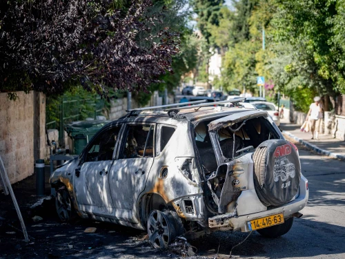 View of a car burned after a garbage bin was set on fire by protesters demanding the release of the hostages in Gaza, near the Prime Minister’s residence in Jerusalem, Sept. 3, 2025. Photo by Chaim Goldberg/Flash90.
