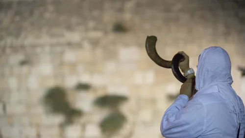 Blowing a shofar at the Western Wall in the Old City of Jerusalem, Sept. 16, 2017. Photo by Yonatan Sindel/Flash90.