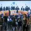 Israelis watch a live screening of a court hearing on petitions against the government's amendment to Basic Law: The Judiciary, at the Tel Aviv Museum of Art, Sept. 12, 2023. Photo by Miriam Alster/Flash90.