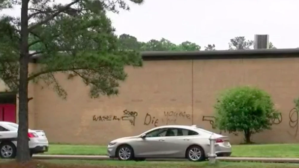 Mills Edwin Godwin High School in Henrico, Va., was vandalized with racist imagery and messages. Credit: Screenshot.